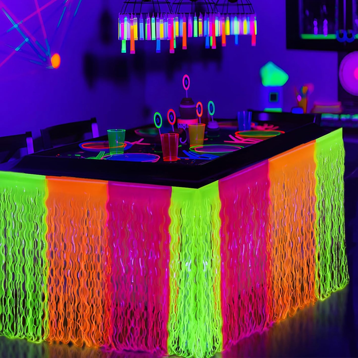 Mega-L Glow in The Dark Party Supplies, 4 Pack Neon Party Decorations Fluorescent Macaron Orange, Yellow and Fuchsia Wavy Metallic Tinsel Foil Fringe Table Skirts, Perfect Table Decors Glow Decors